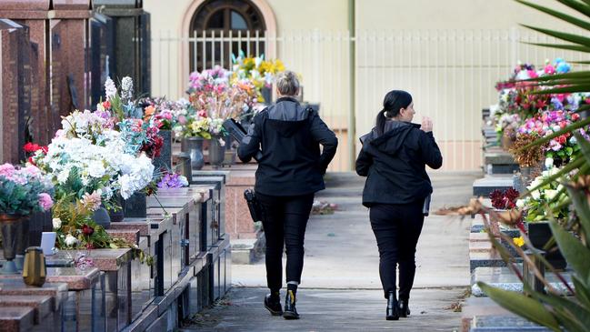 Police at the scene of the break-in at Preston General Cemetery mausoleum. Picture: Andrew Henshaw