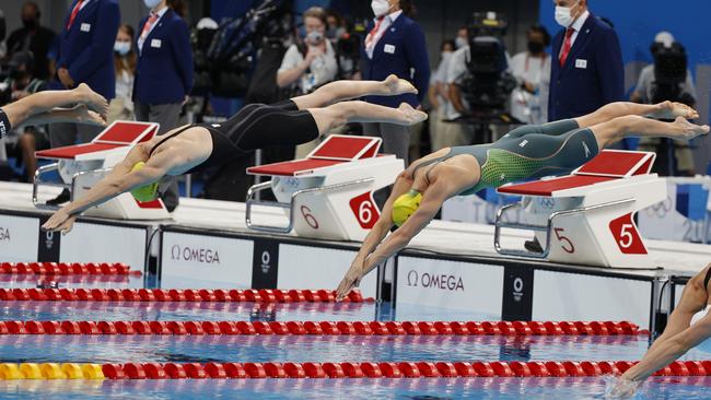 Cate Campbell and Emma McKeon dive in for the women’s 50m freestyle semi-final. Picture: Alex Coppel