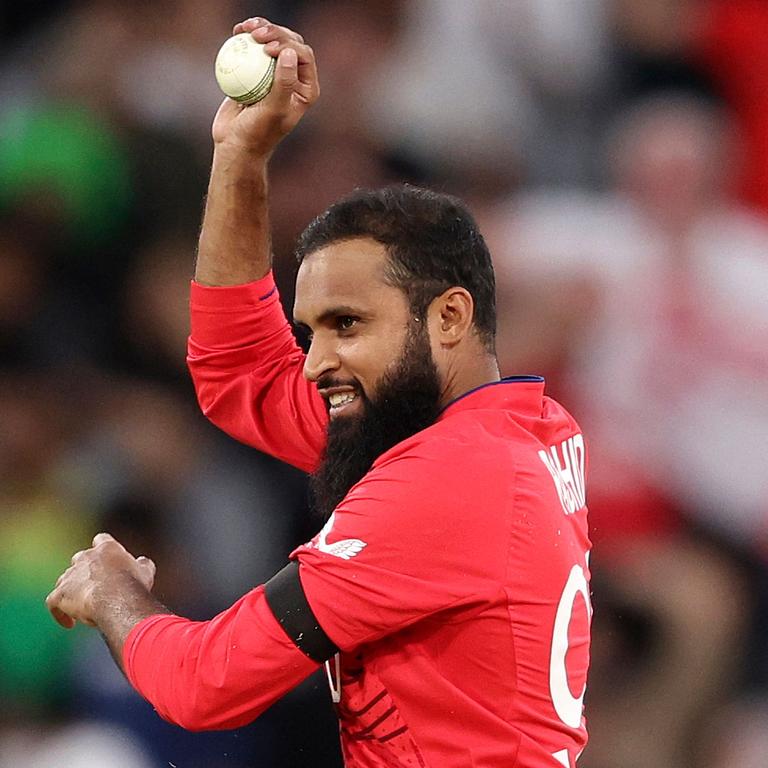 England's Adil Rashid celebrates the wicket of Babar Azam.