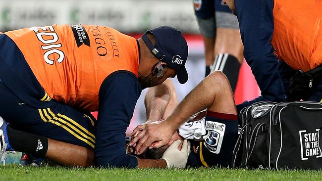 Ben Smith of the Highlanders seeks attention from the medics.