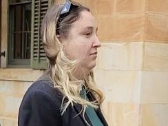 Hannah Neale, centre, charged with child sexual abuse, leaves the, Adelaide Magistrates Court with her lawyer.