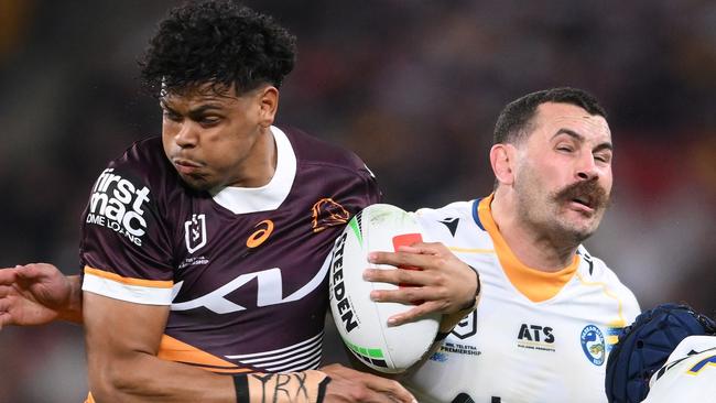 BRISBANE, AUSTRALIA - AUGUST 23: Selwyn Cobbo of the Broncos is tackled during the round 25 NRL match between Brisbane Broncos and Parramatta Eels at Suncorp Stadium, on August 23, 2024, in Brisbane, Australia. (Photo by Matt Roberts/Getty Images)