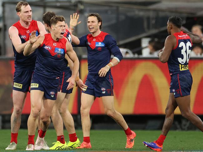 Jake Melksham celebrates during the win over Essendon. Picture: Kelly Defina/Getty Images