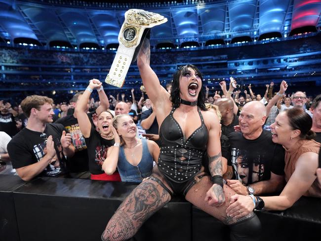 Rhea Ripley celebrates with her family at Optus Stadium in Perth after starring in the Women’s World Championship Match at WWE Elimination Chamber 2024. Picture: WWE