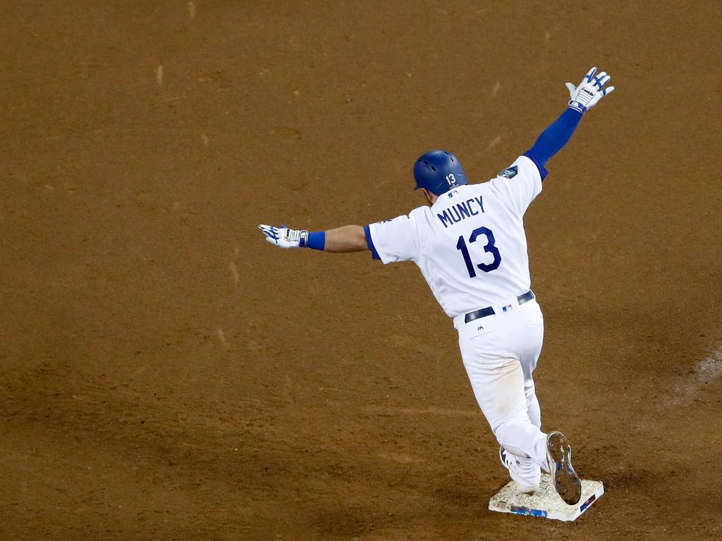 Boston Red Sox Brock Holt tags out Los Angeles Dodgers' Cody