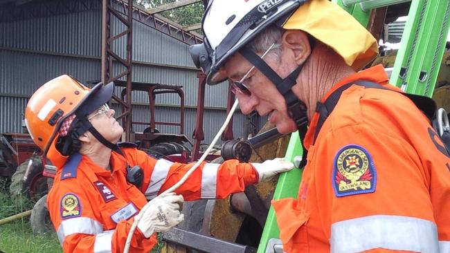 SES Mackay Regional Unit deputy local controller north Jan Lindbergs (left) during her deployment after Tropical Cyclone Yasi crossed the Queensland coast on February 3, 2011.