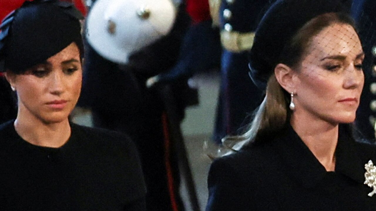 Kate, Princess of Wales and Meghan, Duchess of Sussex as the coffin of Britain's Queen Elizabeth arrives at Westminster Hall. Picture: Getty Images.