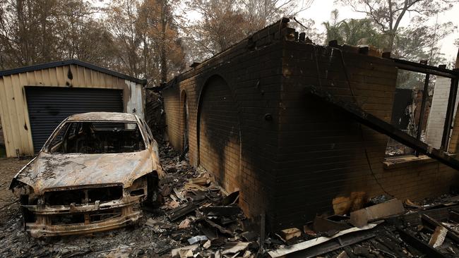 Property destroyed by the Hillville fire on Metz road near Old Bar in the Mid North Coast region of NSW, Tuesday, November 12, 2019. Parts of NSW face catastrophic bushfire danger on Tuesday, with residents in bushland areas told to leave early rather than wait for fresh fires to start. (AAP Image/Darren Pateman) NO ARCHIVING