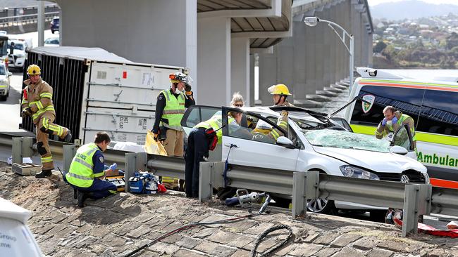 A shipping container has fallen from a truck after a two-vehicle crash on the Tasman Bridge. Picture: SAM ROSEWARNE