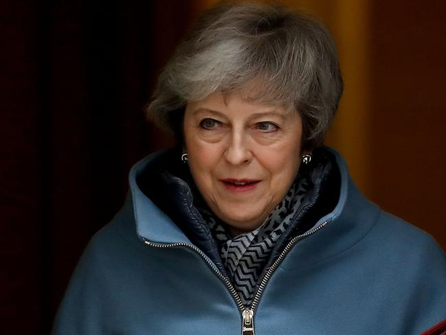 Britain's Prime Minister Theresa May leaves 10 Downing street in central London on March 6, 2019 ahead of Prime Minister's Questions (PMQs). - Europe's financial system faces "potential risks" to its stability arising from a no-deal Brexit, the Bank of England warned Tuesday, as it extended its weekly lending facilities to include euros. (Photo by Tolga AKMEN / AFP)