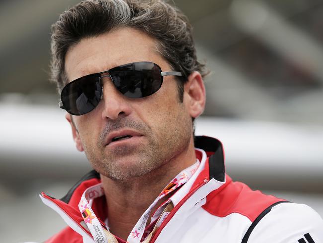 Patrick Dempsey poses outside the Infiniti Red Bull Racing garage before the 2014 German Grand Prix at Hockenheimring. Picture: ADAM PRETTY/GETTY IMAGES