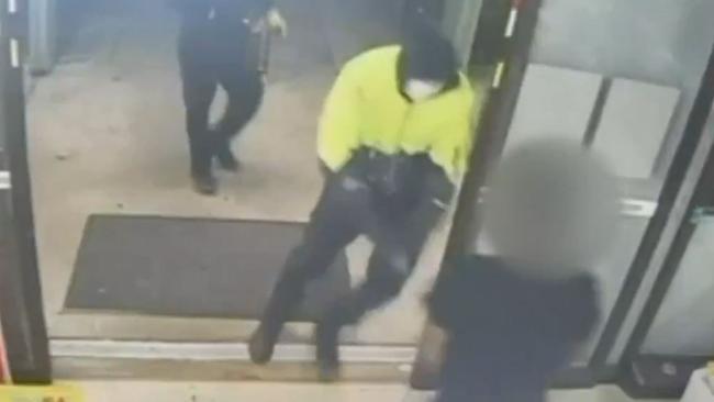 Two robbers held up a supermarket at Trott Park demanding cash and cigarettes. Picture: 7NEWS