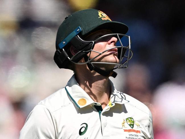 Australia's Steve Smith reacts in frustration after being dismissed by India's Jasprit Bumrah on the second day of the second Test cricket match between Australia and India at the Adelaide Oval in Adelaide on December 7, 2024. (Photo by Michael ERREY / AFP) / -- IMAGE RESTRICTED TO EDITORIAL USE - STRICTLY NO COMMERCIAL USE --