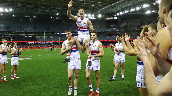 Bulldogs players form a guard of honour to celebrate 250-gamer Dale Morris. Picture: Getty