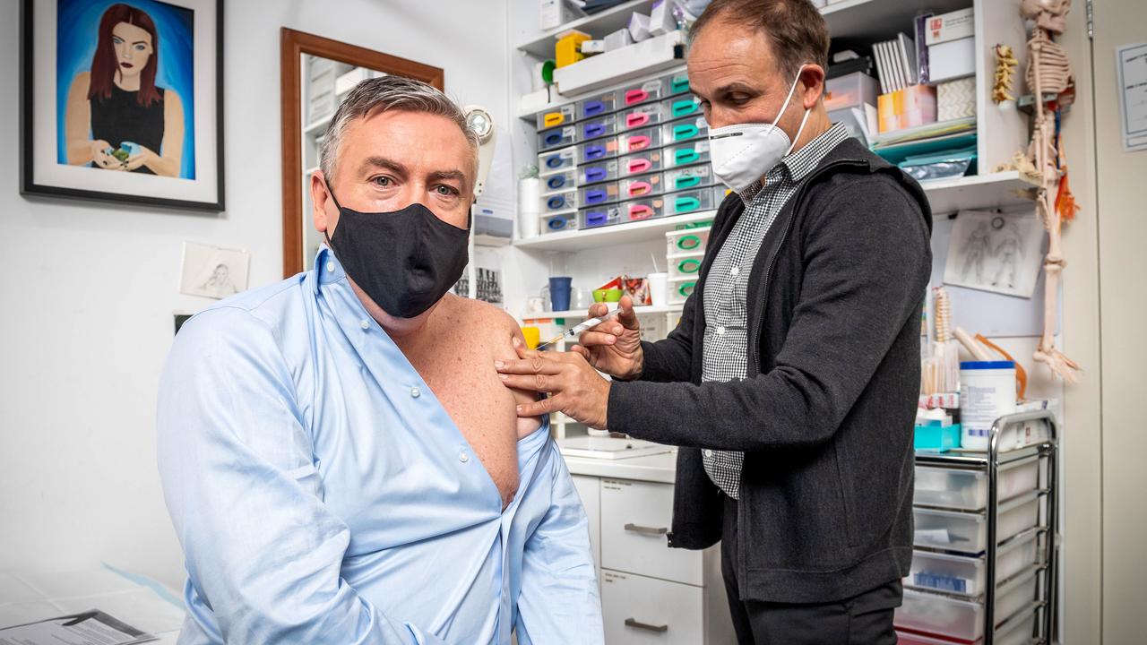 Eddie Mcguire receives a Covid vaccination from Dr Sam Zagarella at Niddrie Medical. Picture: Jake Nowakowski