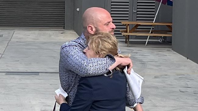 David Celeski embraces his mother after being released from custody. Picture: Julia Kanapathippillai