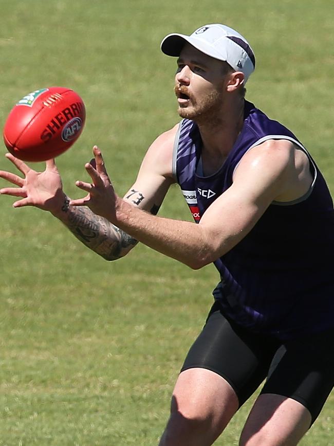 Cam McCarthy, and his moustache, in action at Fremantle pre-season training this week.