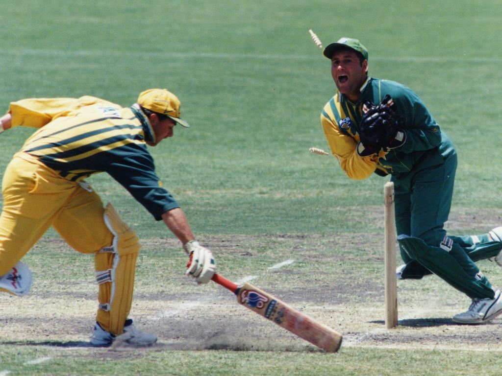 Cricket - Australia vs Australia A World Series Cup match at Adelaide Oval 11 Dec 1994. Phil Emery whips off the bails to run out Australian batsman Tim May in a third-umpire decision.