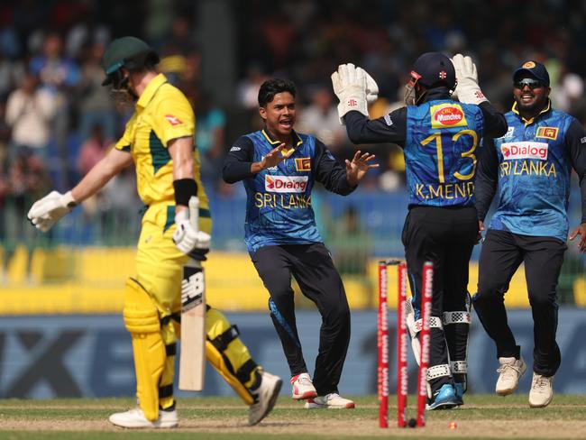 Sri Lanka’s Dunith Wellalage celebrates after taking the wicket of Steve Smith with his first ball. Picture: Getty Images