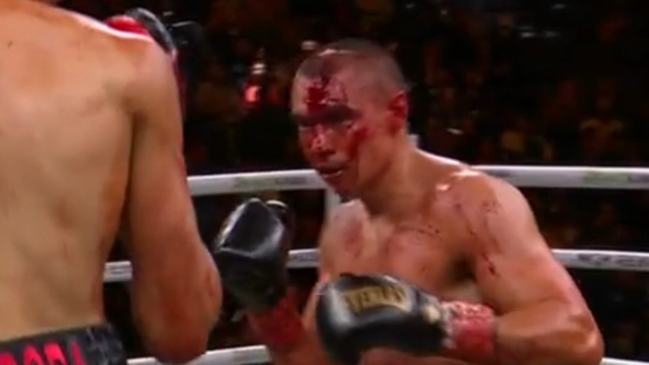 Tszyu was a bleeding mess in the fourth round. Photo: Fox Sports