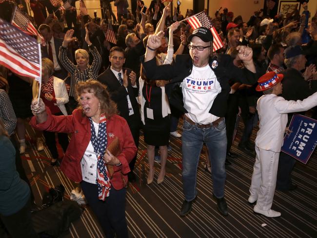 Jake Viano jumps in the air as President-elect Donald Trump gives his acceptance speech at the Colorado Republican election night party Wednesday, Nov. 9, 2016, in Greenwood Village, Colo. (AP Photo/Jack Dempsey)