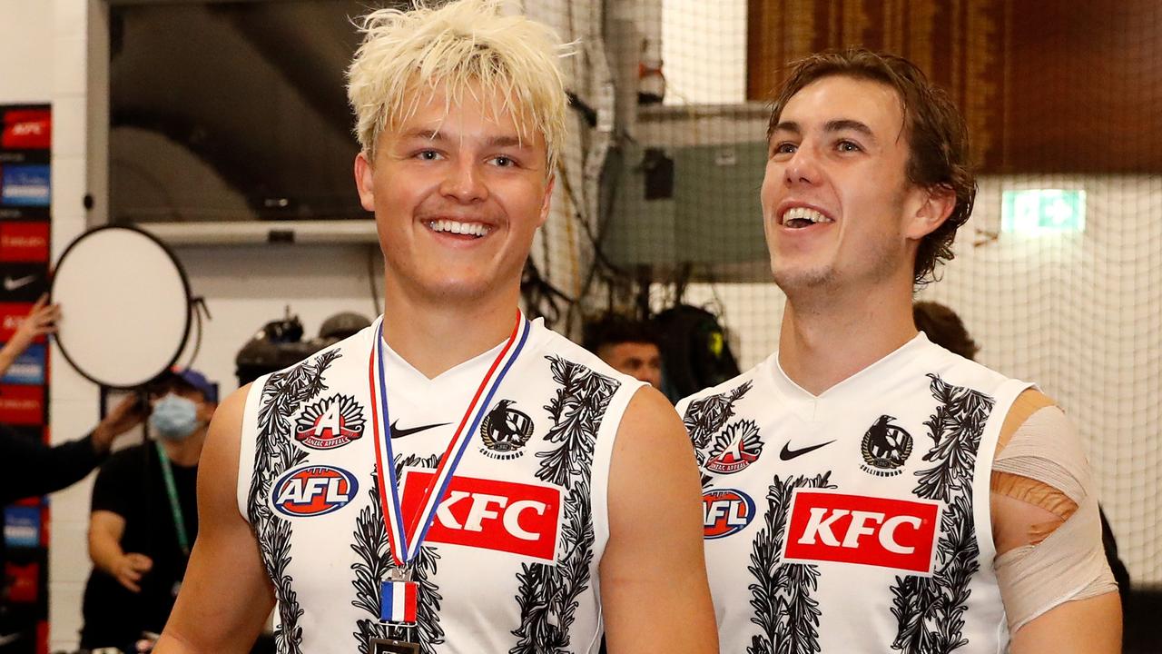 Jack Ginnivan celebrates with teammate Callum Brown after Collingwood won the Anzac Day match. Picture: Dylan Burns