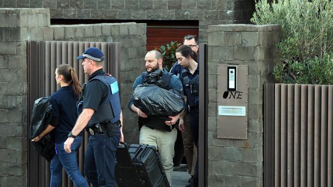 Police and forensic officers outside John Ibrahim's house in Dover Heights. Picture: Richard Dobson