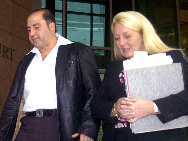 Tony Mokbel  leaves Melbourne Magistrates Court with his lawyer, Nicola Gobbo.