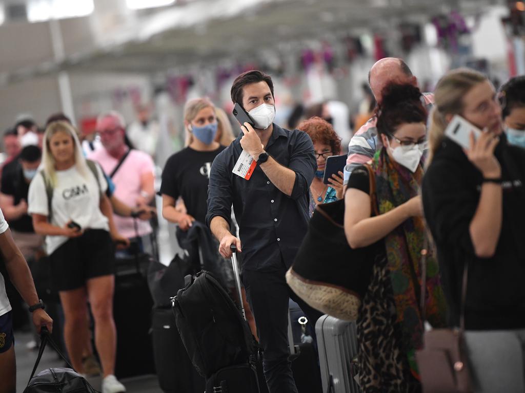 Sydney Airport is packed as people rush to leave the state. NCA NewsWire/Joel Carrett