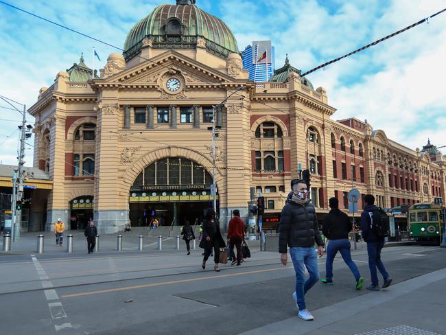 People wearing masks in Melbourne during the Covid-19 pandemic. Picture: Alex Coppel.