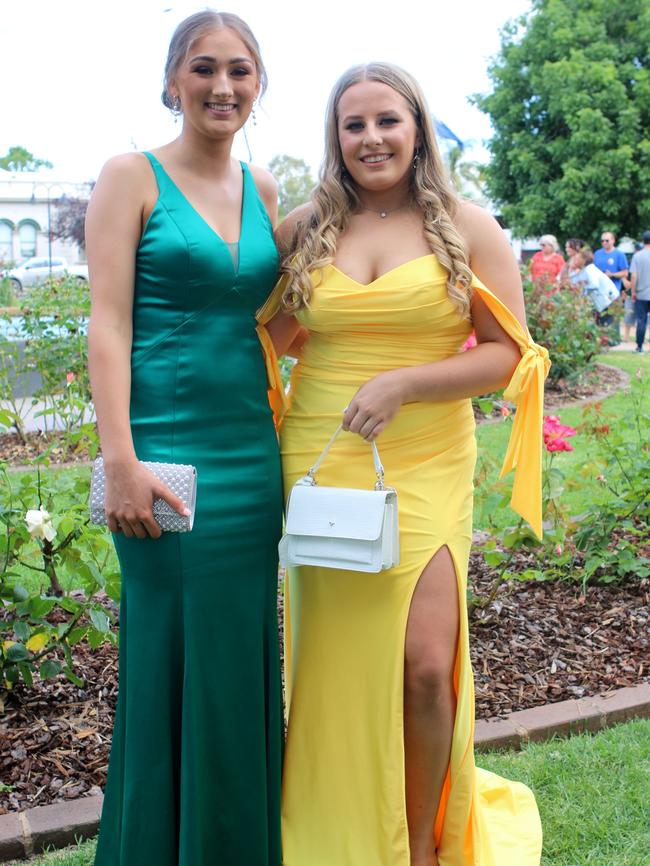 Jaime Esler and Jemma Davey donned vibrant outfits for the formal.