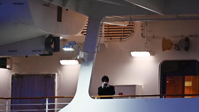 Crew also had to remain on the ship. Picture: AFP/CHARLY TRIBALLEAU