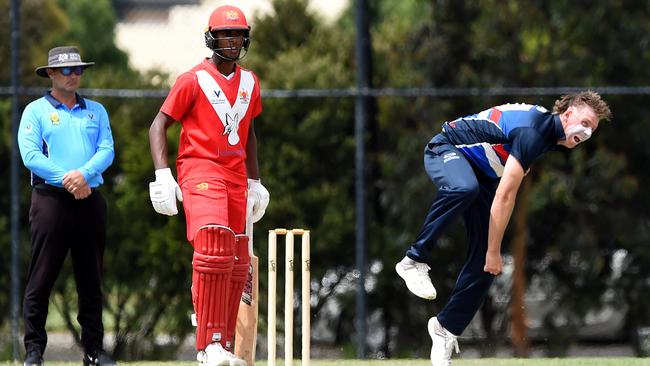 Casey batsman Ashley Chandrasinghe and Footscray bowler Jake Reed. Picture: Steve Tanner