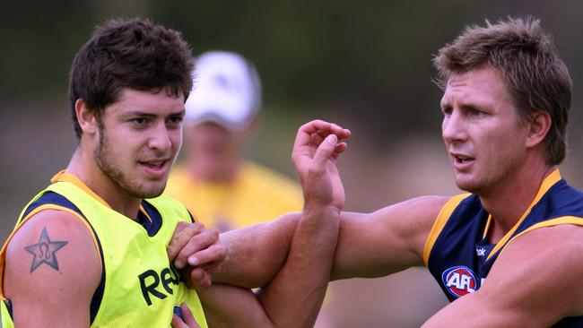 Will Young (left) played two games for the Crows.