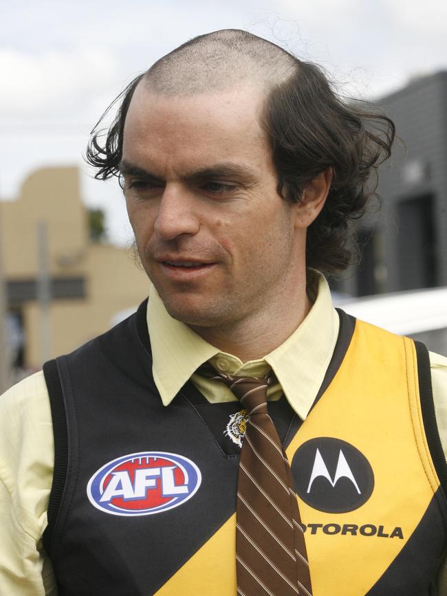 Matthew Scarlett dresses as Kevin Bartlett during Mad Monday celebrations.