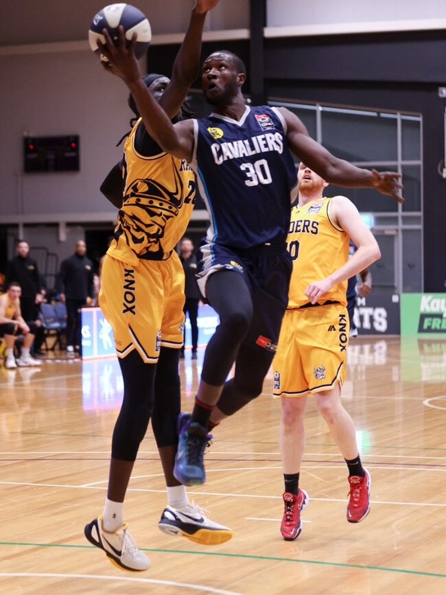 Mangok Mathiang is back mixing it up on the court for Casey Cavaliers in NBL1 South. Picture: In2Action Photography