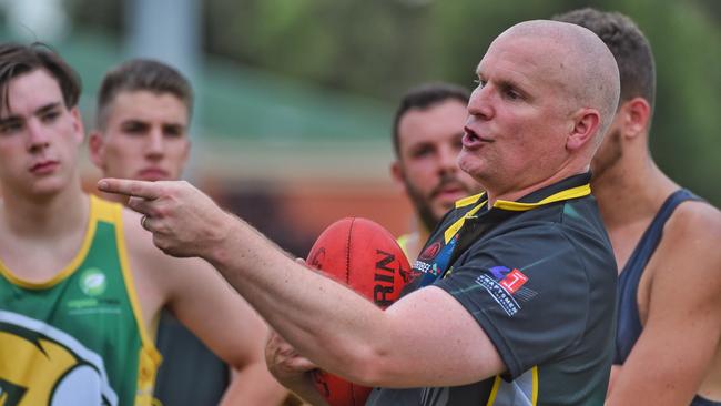 Werribee Centrals coach Nick Smith puts the reserves and under 19’s through their paces. Picture: Tony Gough