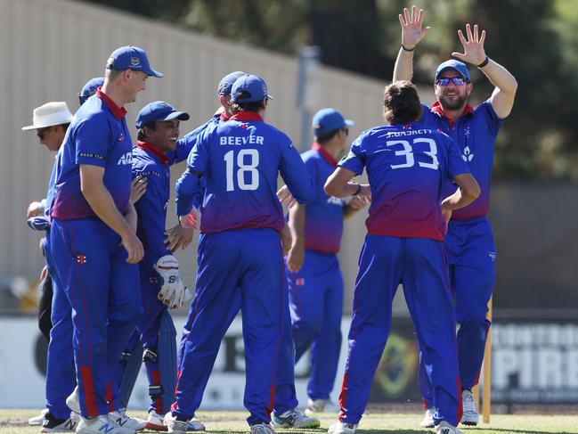 VTCA: Keilor celebrate a wicket. Picture: Stuart Milligan