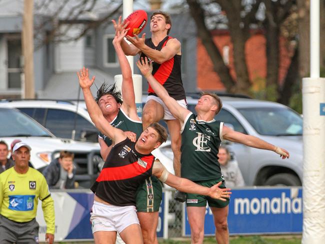 Kyabram’s Kyle Mueller soars over the pack against Echuca. Picture: Aaron Cook