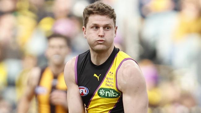 MELBOURNE, AUSTRALIA - JULY 22: Jacob Hopper of the Tigers runs with the ball during the round 19 AFL match between Richmond Tigers and Hawthorn Hawks at Melbourne Cricket Ground, on July 22, 2023, in Melbourne, Australia. (Photo by Darrian Traynor/Getty Images)