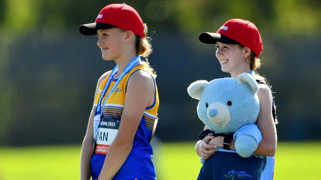 Smiles all around. Silver medallist Jillian Ryan (ACT) and gold medallist Sophie Polkinghorne after the Girls U13 1500m Walk.