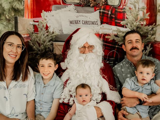 Santa is pictured with Coral-Anne Watters, Tommy West, Lulu West, Remi West, and Shannon West: Bee Me Photography Marian 2023 - Mackay. Sent in by Coral-anne Watters.