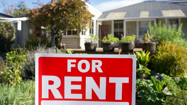 A For Rent Sign Outside a House.