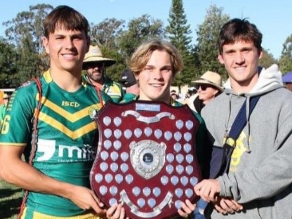 Harrison Hill celebrates St Brendan's Confraternity Shield win in 2023 with his teammates.