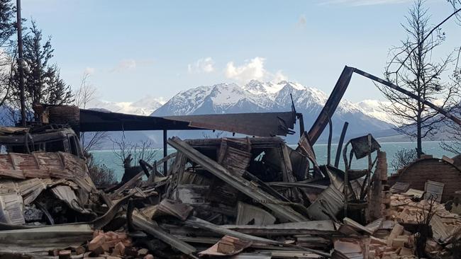 The remains of a home in Lake Ohau on Monday. Picture: Gary Kircher via AFP