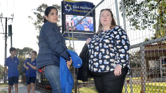 Parents Sarah and Lisa, have several children at the school between them, and were concerned about the classroom closures. Picture: Dean Martin