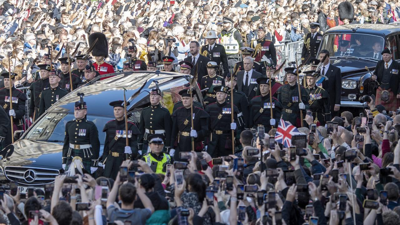 Vast crowds looked on at the procession from Palace of Holyroodhouse to St Giles' Cathedral in Edinburgh. (Photo by Lesley Martin – WPA Pool/Getty Images)