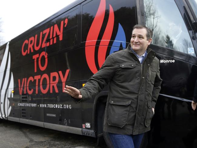 Unabashed hard line right winger ... Republican presidential candidate, Senator Ted Cruz, R-Texas gets off his bus for a campaign event in Weare, New Hampshire. Picture: AP / Elise Amendola