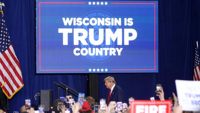 Mr Trump departs after speaking during a campaign rally in Green Bay, Wisconsin. Picture: AFP