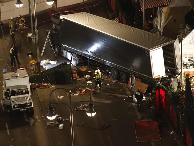 Authorities inspect a truck that had sped into a Christmas market in Berlin. Picture: AFP